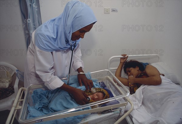 SOMALILAND, Hargeisa, Nurse attending new born baby in the Edna Adan maternity hospital.