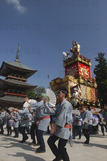 JAPAN, Chiba, Narita , Gion Matsuri. Members dance in front of Narita san Temple before pulling neighborhood dashi or wagon through the streets