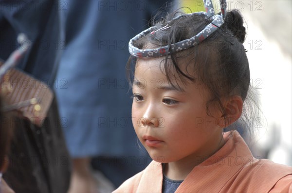 JAPAN, Chiba, Narita, "Etsuko Watanabe, 8 years old, is a ""tekomae"" which is a young girl who walks in front of the wagon in the Gion Matsuri"