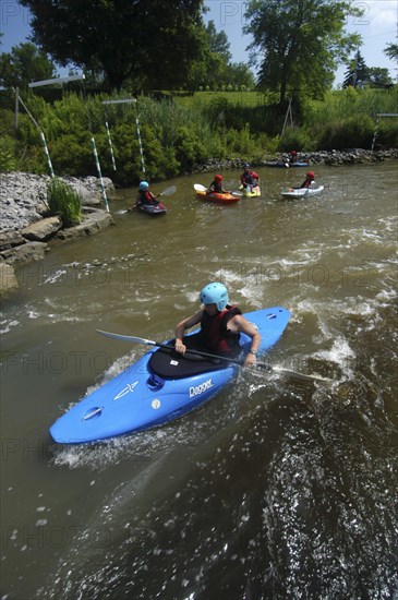 USA, New York, Rochester, "Japanese student, Alex Romanov, during a kayaking class of Genessee Waterways Center at Lock 32"