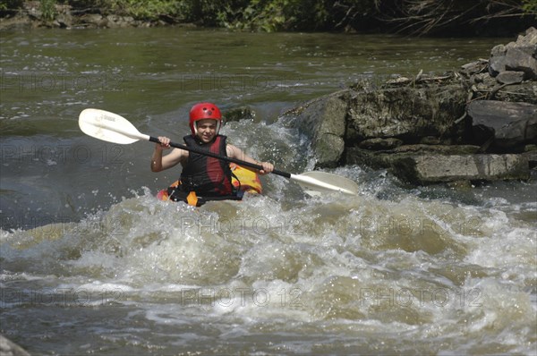 USA, New York, Rochester , 11 year old Becky Taylor in kayak class of Genessee Waterways Center at Lock 32