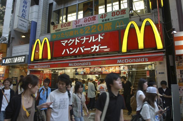 JAPAN, Honshu, Tokyo, Shinjuku. McDonalds restaurant in Kabukicho entertainment district on Saturday evening