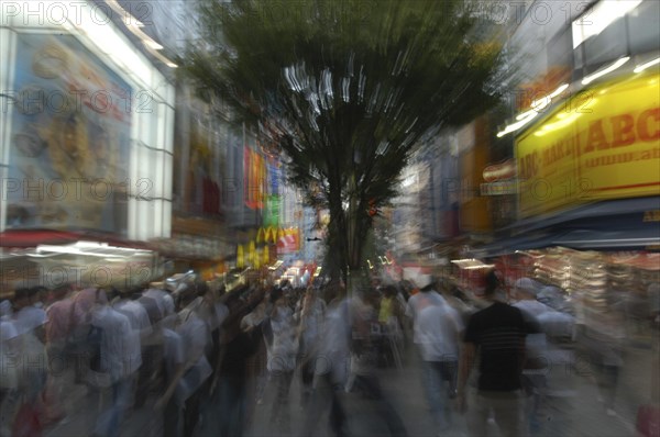 JAPAN, Honshu, Tokyo, Shinjuku. Entertainment district Kabukicho on Saturday evening.  Motion Blur.