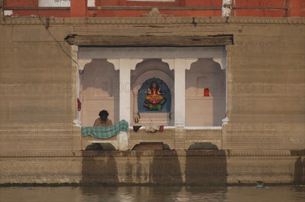INDIA, Uttar Pradesh, Varanasi , Shrine to the goddess Ganga on the Ganges River near Mir Ghat