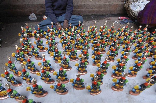 INDIA, Uttar Pradesh, Varanasi, Figurines of Kala Bhairava for sale outside Kala Bhairava Temple
