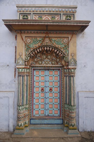 INDIA, Uttar Pradesh, Varanasi , Ghai Ghat. A decorated doorway