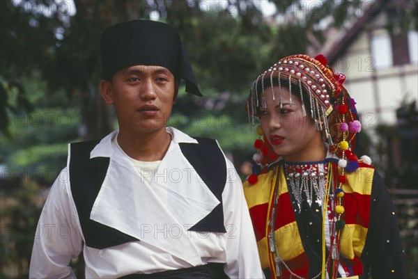 MYANMAR, Kachin State, Manhkring, Lisu man and woman in traditional Lisu attire of the Myitkyina area