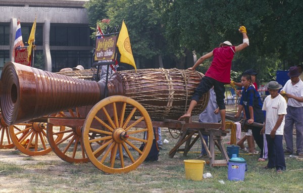 THAILAND, Chiang Mai, Cannon drum competition with drummer beating drum