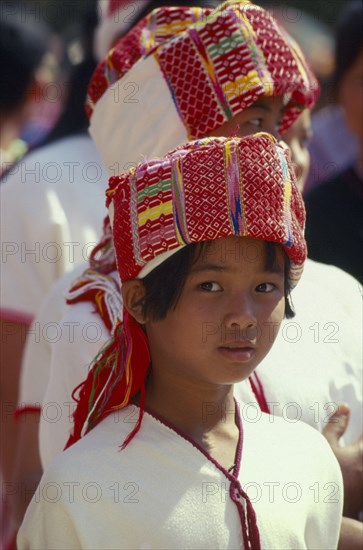 THAILAND, Chiang Mai Province, Mae Jaem, Portrait of a Sgaw Karen girl in traditional umarried females attire