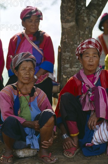 THAILAND, Chiang Rai Province, Huai Khrai, Lisu women watching the New Year festivities