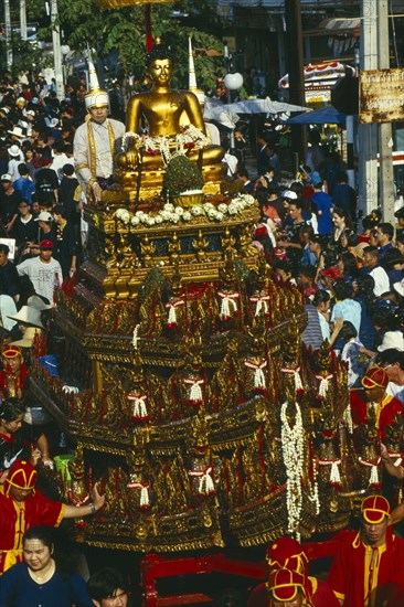 THAILAND, Chiang Mai, Songkran aka Thai New Year. Buddha image in lustration parade near Wat Phra Singh