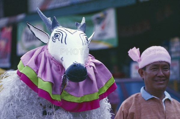 THAILAND, Chiang Mai, Shan Poi San Long. Crystal Children ceremony with Antelope and man in Shan costume