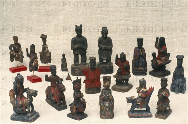 THAILAND, Chiang Mai, Yao carved wooden figures used in Taoist religious ceremonies