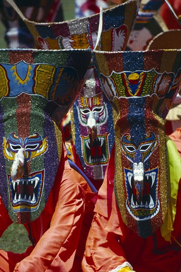 THAILAND, Loei Province, Dan Sai, Phi Ta Khon or Spirit Festival. People wearing brightly coloured spirit masks