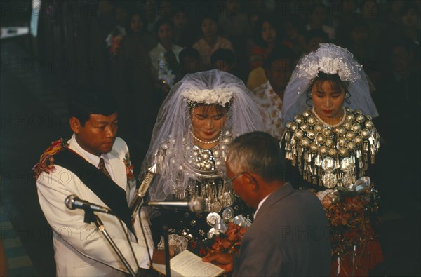 MYANMAR, Kachin State, Myitkyina, Jinghpaw wedding service with Bride and Groom at the Geis memorial church