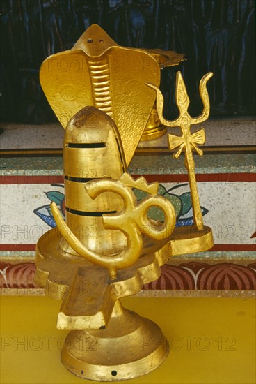 THAILAND, Chiang Mai Province, Golden statue encorporating the symbols of the Hindu god Siva at the Kuan Yin Centre