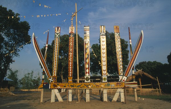 MYANMAR, Kachin State, Myitkyina, Jinghpaw Manao posts at Manao grounds