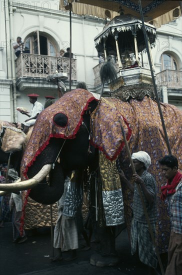 SRI LANKA, Kandy, Esala Perahera festival parade with decorated elephant carrying replica of the golden relic casket containing Buddhas tooth.