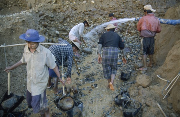 MYANMAR, Work, Mining, Gold workers at the source of the Ayeyarawady River at the confluence of the Mali Kha and the Ma Kha rivers in upper Myanmar.