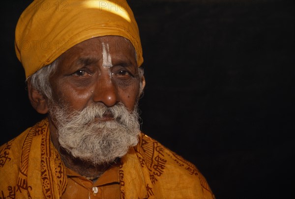 MYANMAR, Religion, Hinduism, Head and shoulders portrait of Hindu priest during festival at the confluence of the Ayeyarawady north of Myitkyina in upper Myanmar.