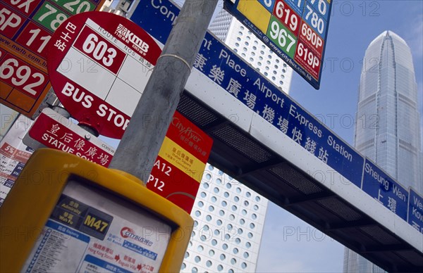 CHINA, Hong Kong, Cropped view of road signs and bus stop.