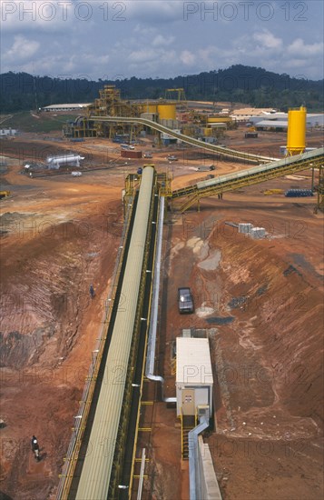GHANA, Industry, Elevated view over gold mine and machinery.