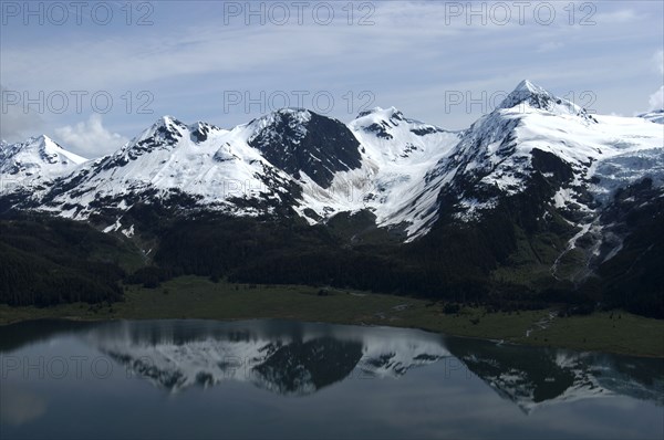 USA, Alaska, Prince William Sound, View over waters toward snow capped mountain peaks