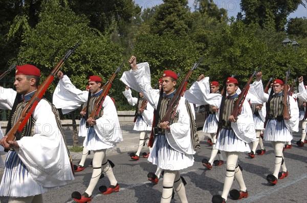 GREECE, Athens, Evzone soldiers in uniform marching in the street