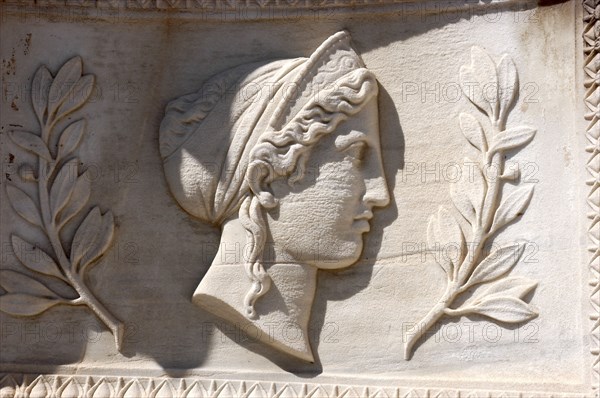 GREECE, Athens, Carved stone relief depicting womans head and profile