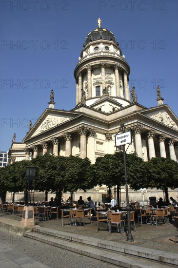 GERMANY, Berlin, Deutsche Kirche or German Church with street cafe on the Gendarmenmarkt