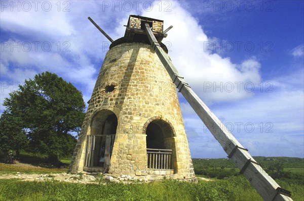 WEST INDIES, Antigua, Small yellow brick windmill