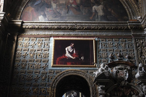 MALTA, Valletta, Interior of St Johns Cathedral with hanging artwork and frescoe