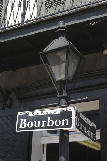 USA, Louisiana, New Orleans, French Quarter. Lamp post and Rue Bourbon street sign