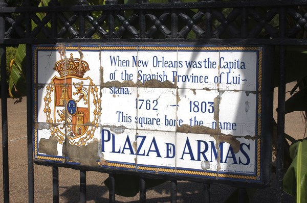 USA, Louisiana, New Orleans, French Quarter. Tiled plaque on wrought iron gate of the historically known Plaza d Armas