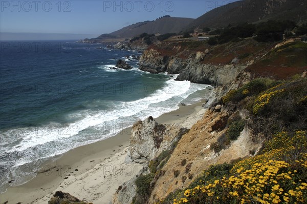 USA, California, Big Sur, Pacific Coast Highway. View over sandy bay and rocky coastline