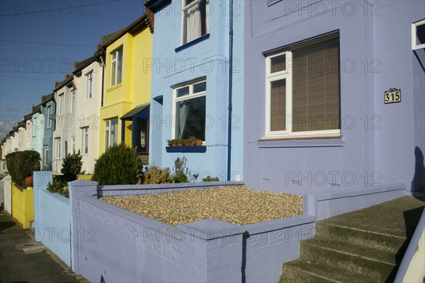 ENGLAND, East Sussex, Brighton, Brightly coloured terraced houses on Bear Road