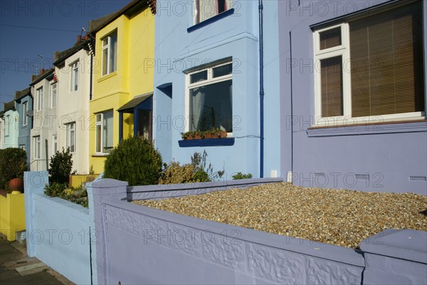 ENGLAND, East Sussex, Brighton, Brightly coloured terraced houses on Bear Road