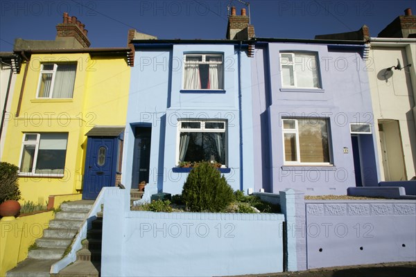 ENGLAND, East Sussex, Brighton, Brightly coloured terraced houses on Bear Road