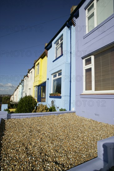 ENGLAND, East Sussex, Brighton, Brightly coloured terraced houses on Bear Road