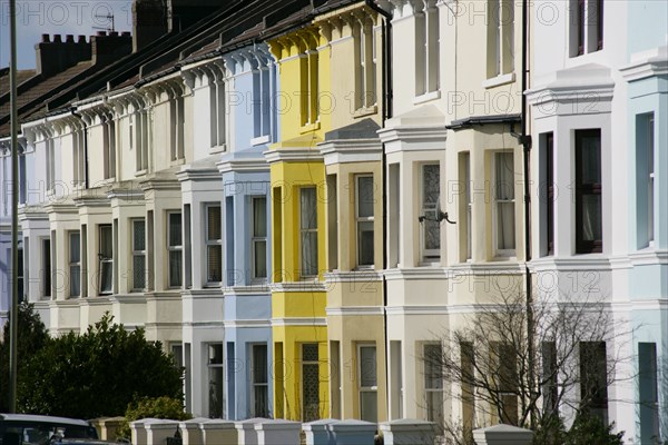 ENGLAND, East Sussex, Brighton, Brightly coloured terraced houses in Hanover area