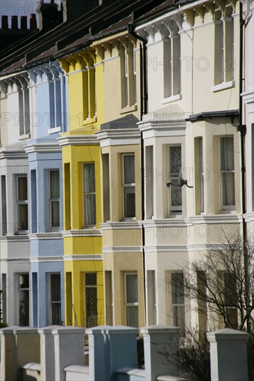 ENGLAND, East Sussex, Brighton, Brightly coloured terraced houses in Hanover area