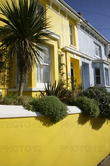 ENGLAND, East Sussex, Brighton, Brightly coloured terraced houses in Kemp Town