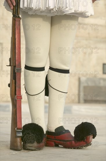 GREECE, Athens, Detail of Evzones uniform during ceremonial changing of the guard at the Parliament Building.