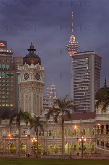 MALAYSIA, Kuala Lumpur, City centre skyline from Merdeka Square with The Sultan Abdul Samad Building in the foreground The Menara Kuala Lumpur  and Petronas Towers behind.