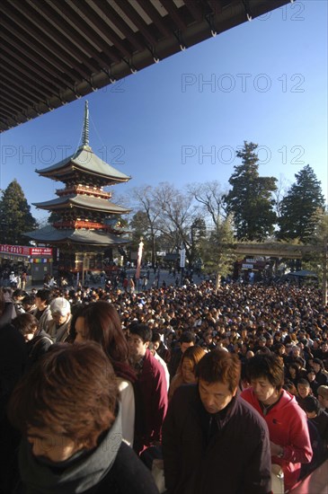 JAPAN, Honshu, Chiba , New Years Holiday worshippers crowd the steps of Narita San Temple