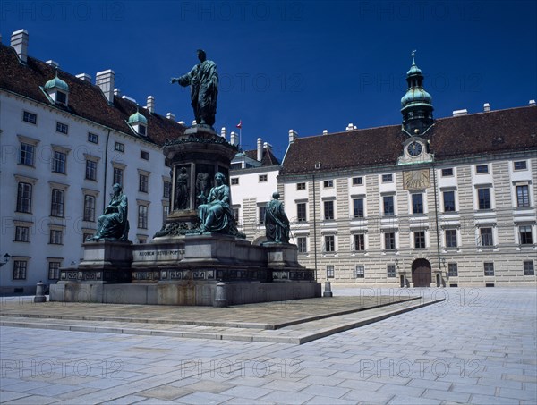 AUSTRIA, Vienna, Hofburg Royal Palace. In der Burg Courtyard with monument to Emperor Franz I and Leopold Wing to the left behind