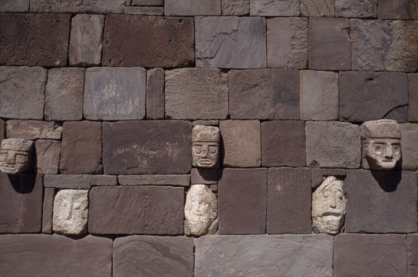 BOLIVIA, La Paz, Tiwanacu, Detail of wall of the Templo Semisubterraneo sunken temple with protruding stone heads