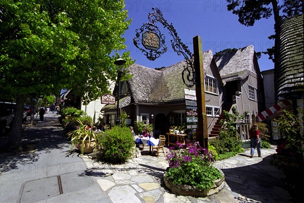 USA, California, Carmel, Porta Bella Restaurant and The Court of the Golden Bough shopping arcade on Ocean Avenue