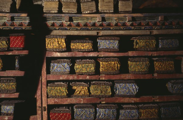 NEPAL, Mustang, Tsarang, Ancient Tibetan Buddhist texts stored in Old Palace.