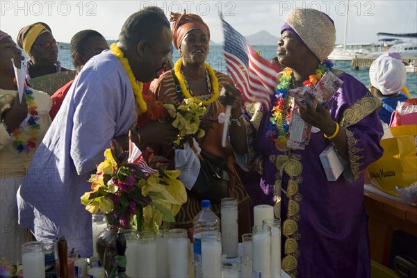 WEST INDIES, St Vincent & The Grenadines, Union Island, Baptist preacher and congregation in Clifton at Easter morning harbourside service for those lost at sea